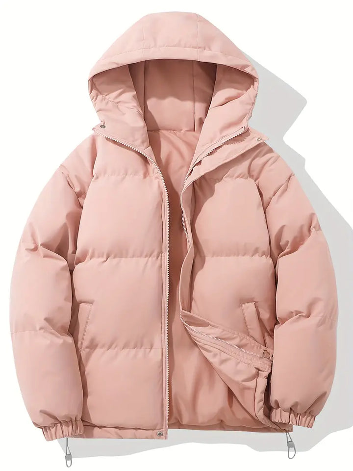 Warm women's hooded puffer jacket with chic quilting. A stylish and practical winter coat for everyday wear.