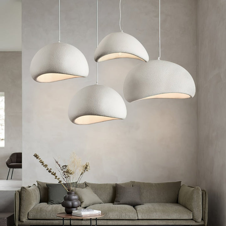 Contemporary dome pendant light, sleek design with adjustable height, ideal for modern living rooms.