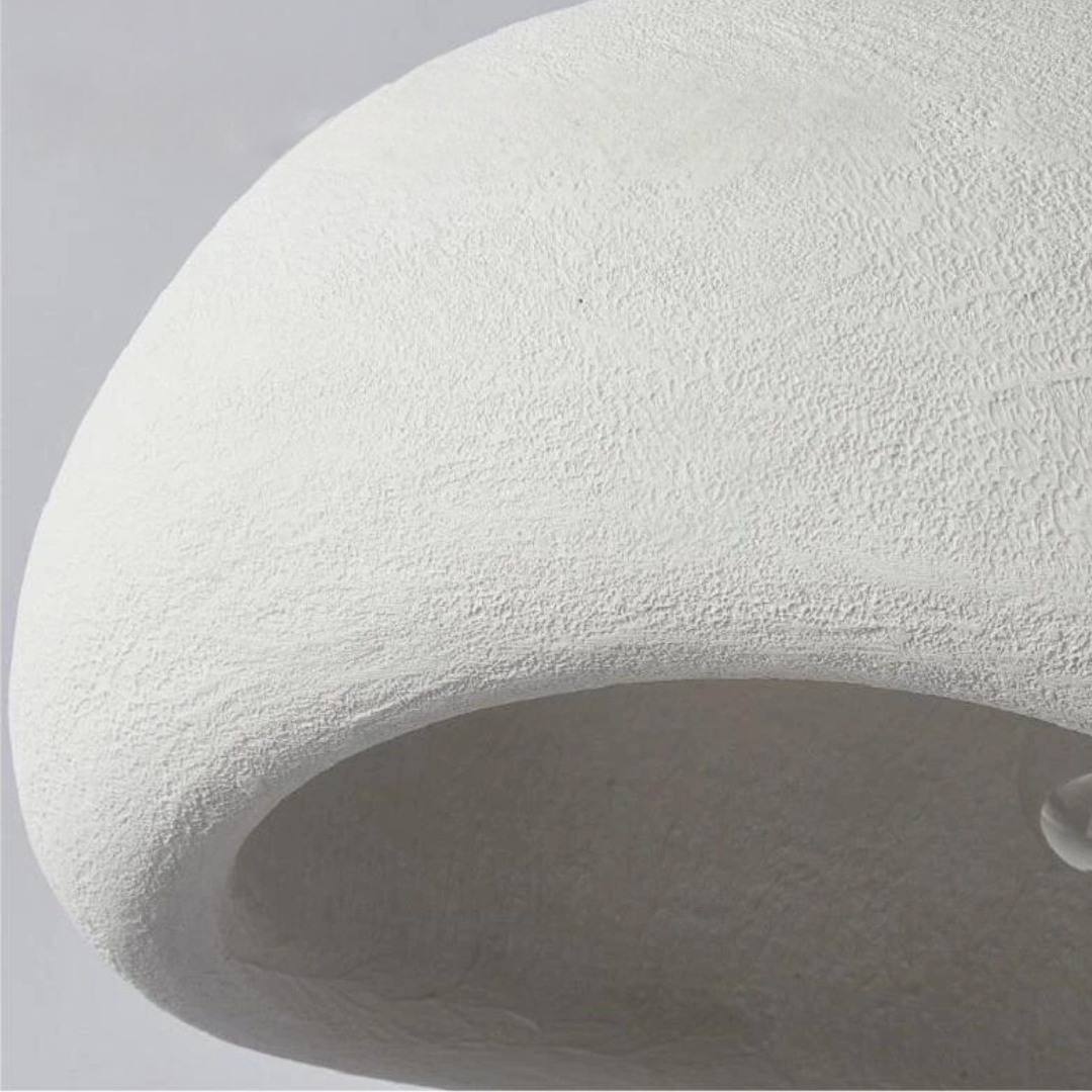 Designer sculpted dome light, adjustable height for dining or living room, a modern statement piece.