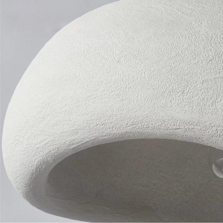 Designer sculpted dome light, adjustable height for dining or living room, a modern statement piece.
