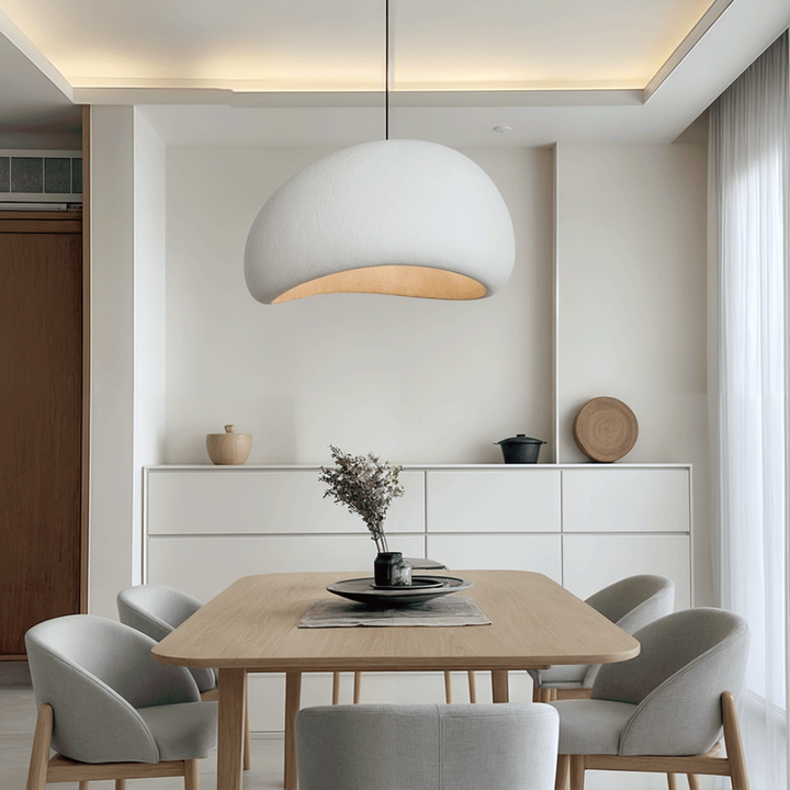 Elegant dome design pendant light, adjustable height, for contemporary dining and living spaces.