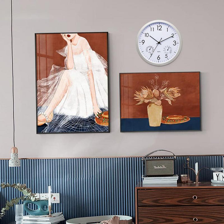 Retro-style weatherproof outdoor clock with integrated temperature gauge, ideal garden decor for any home.