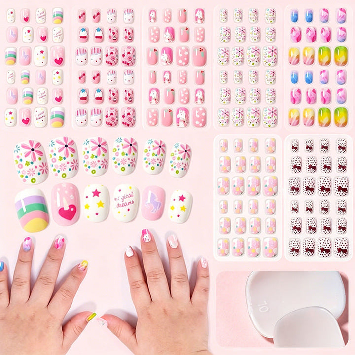 Whimsical cartoon press-on nails for women. Easy DIY false nail art set for a cute and playful manicure.