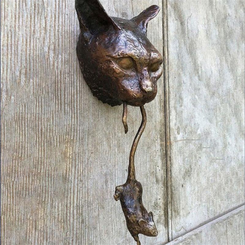 Unique cat and mouse door knocker, a decorative resin home accent for an eye-catching entryway.
