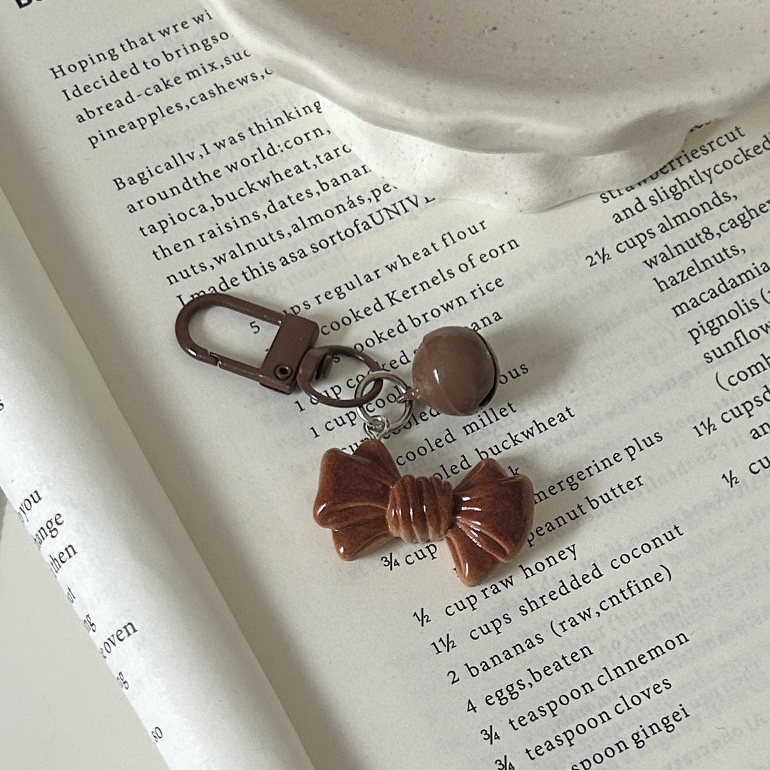 Fun donut charm pendant, versatile for necklaces, keychains, or bag accessories; a charming, unique gift.