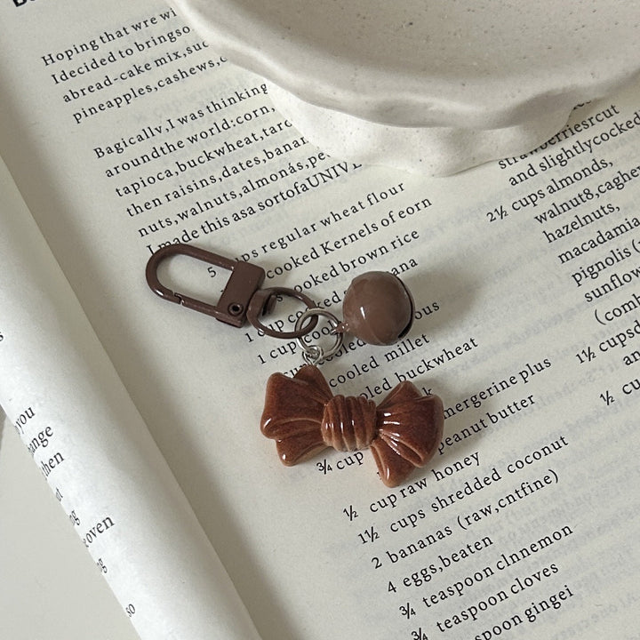 Fun donut charm pendant, versatile for necklaces, keychains, or bag accessories; a charming, unique gift.