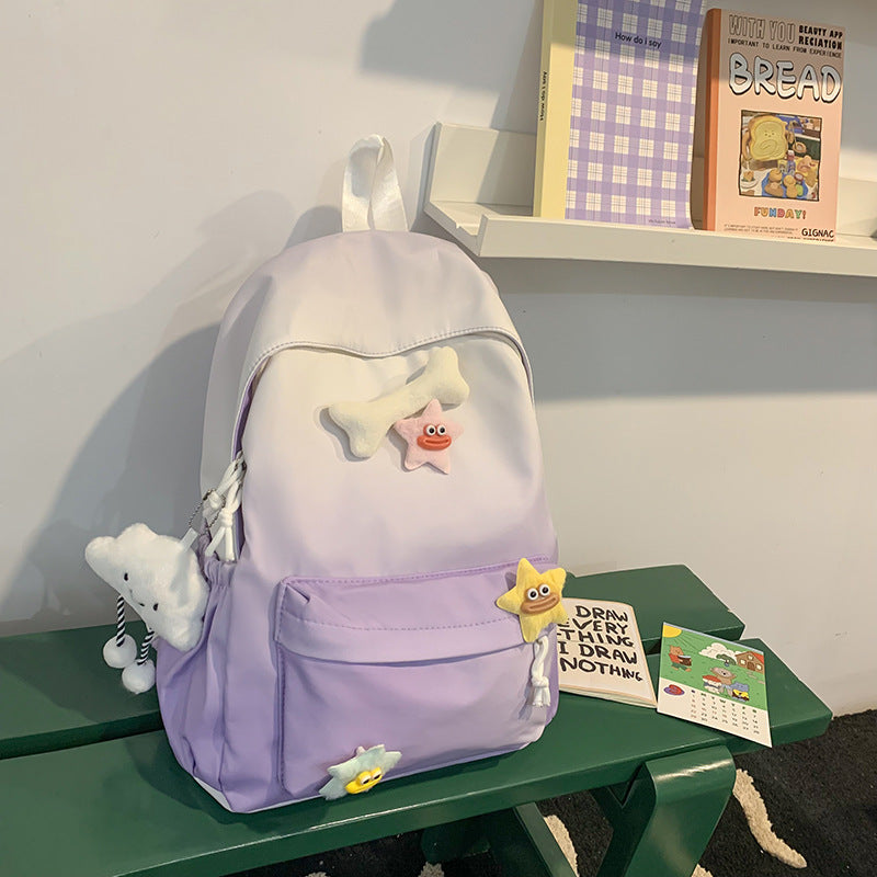 Whimsical purple character backpack for kids' school & fun. Durable unisex design, perfect travel bag.