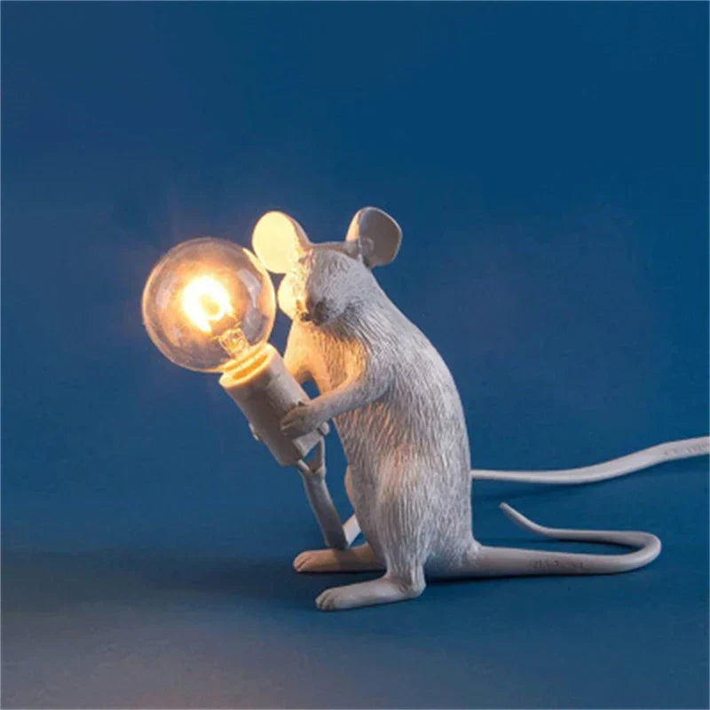 Whimsical resin rat desk lamp, perfect for unique home decor and ambient lighting. Max 125 chars.