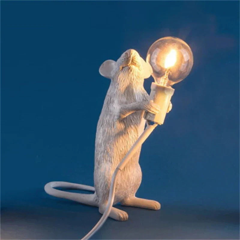 Stylish rat lamp, a unique table light and whimsical home accent for any modern or eclectic room.
