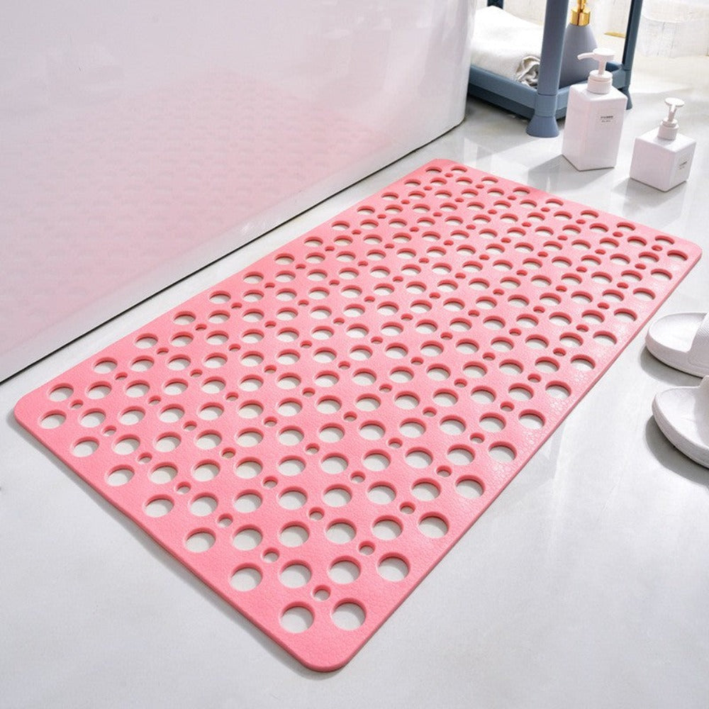 Durable anti-slip shower mat with strong suction cups ensuring secure footing and preventing falls in wet bathrooms.