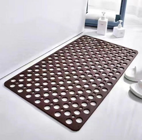 Rectangular anti-slip shower mat with patterned surface and reliable suction cups for superior bathroom safety.