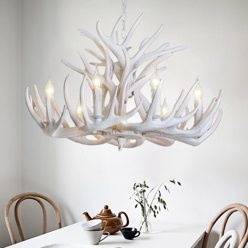 White antler chandelier, a rustic and elegant lighting fixture. Multi-bulb design for ample light.