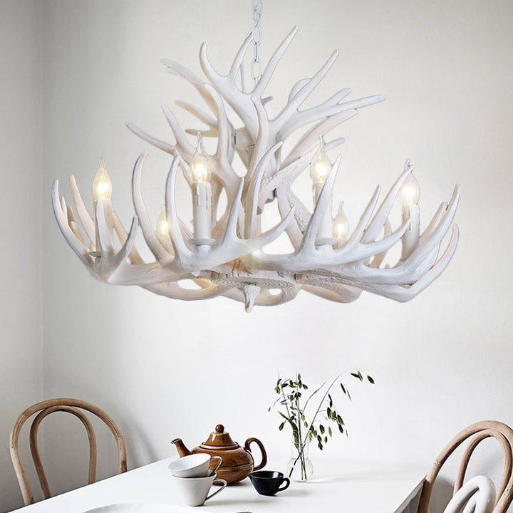 White antler chandelier, a rustic and elegant lighting fixture. Multi-bulb design for ample light.