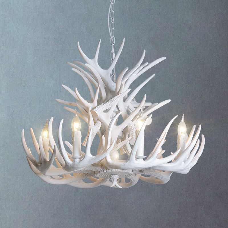 White antler chandelier for rustic home lighting, a unique and stylish lodge decor piece.