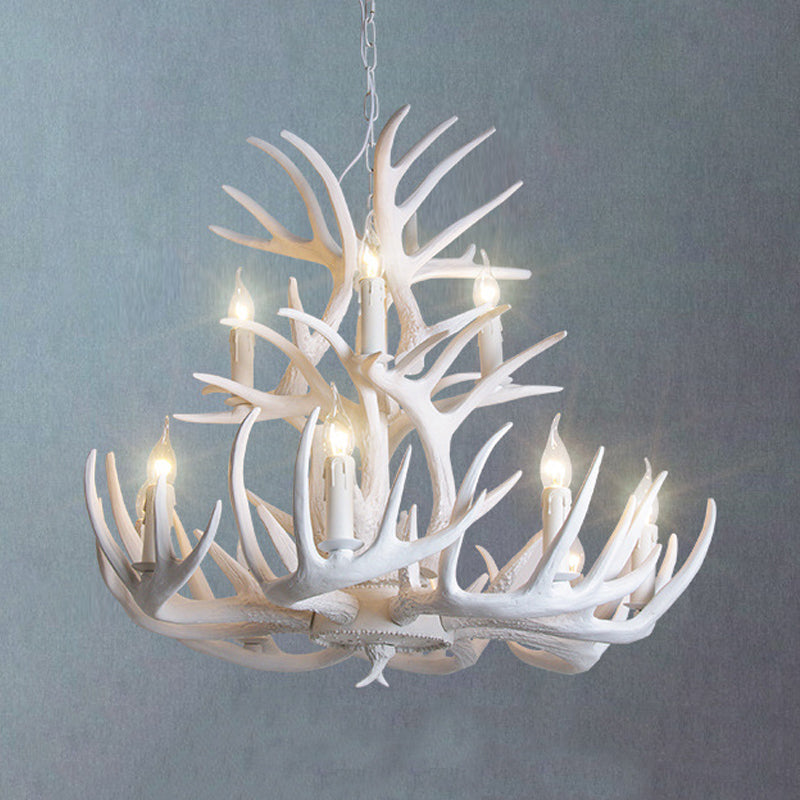 Multi-light white antler chandelier for rustic home decor. Resin material, lodge aesthetic.