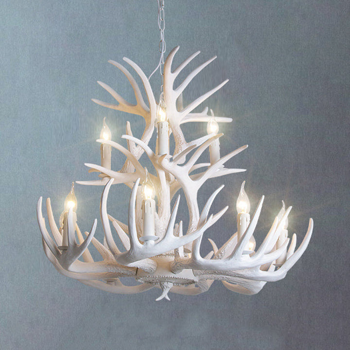 Multi-light white antler chandelier for rustic home decor. Resin material, lodge aesthetic.