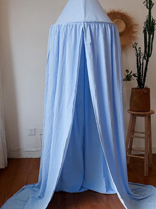 Magical baby nursery bed canopy transforming a child's room into a whimsical, dreamy play space.