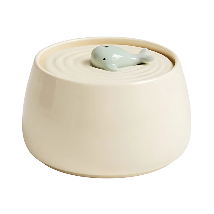Durable ceramic pet fountain for healthy hydration. Features a silent pump & filtration for fresh, clean water.
