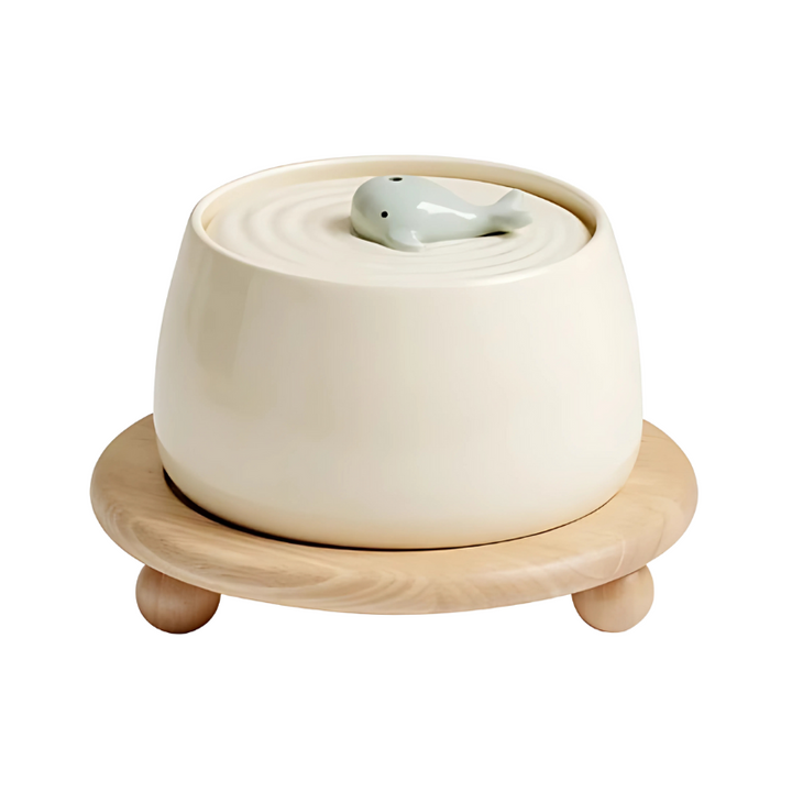 Healthy hydration: Ceramic pet water fountain for cats & dogs with silent pump and effective filtration system.