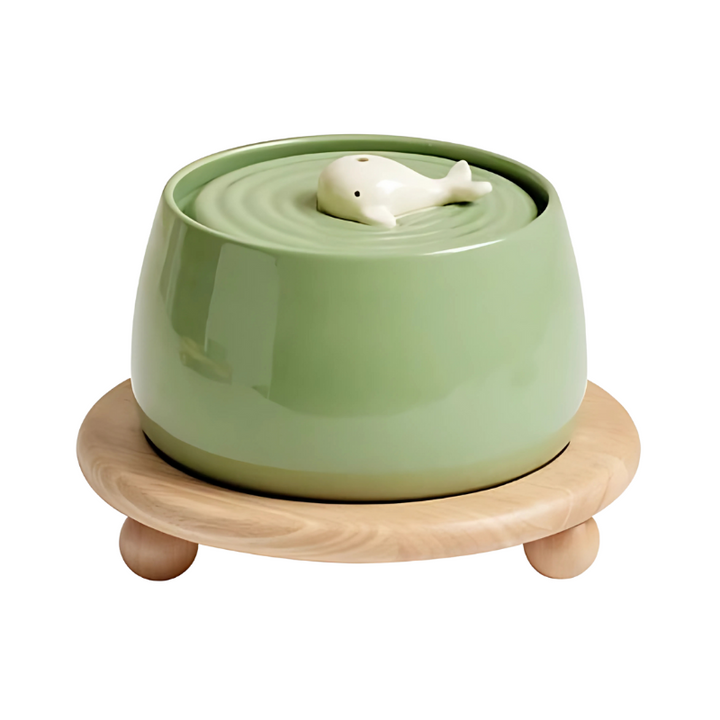 Premium ceramic pet drinking fountain with silent water flow & activated carbon filtration for pure, fresh water.