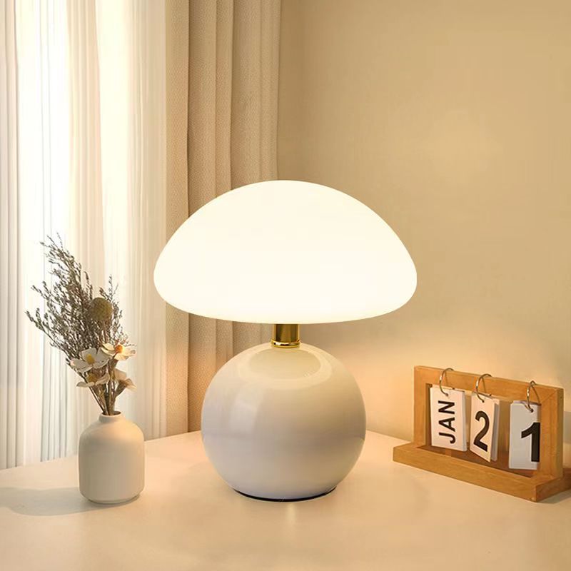 White decorative mushroom table lamp with adjustable LED colors for home decor.