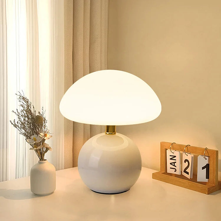 Contemporary mushroom table lamp, LED with various color settings.