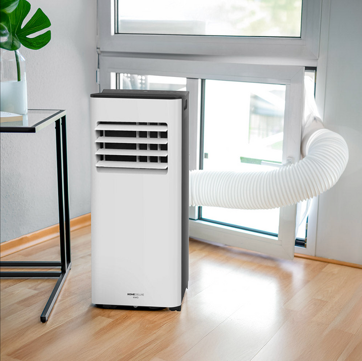 Compact 3-in-1 portable air conditioner, dehumidifier, and fan for versatile home climate control.