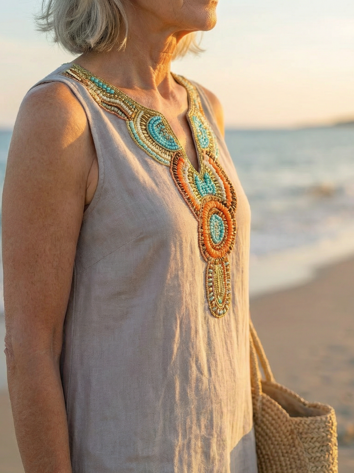 Lightweight, breathable sky blue women's midi dress with embroidered accents. Perfect for sunny summer days.