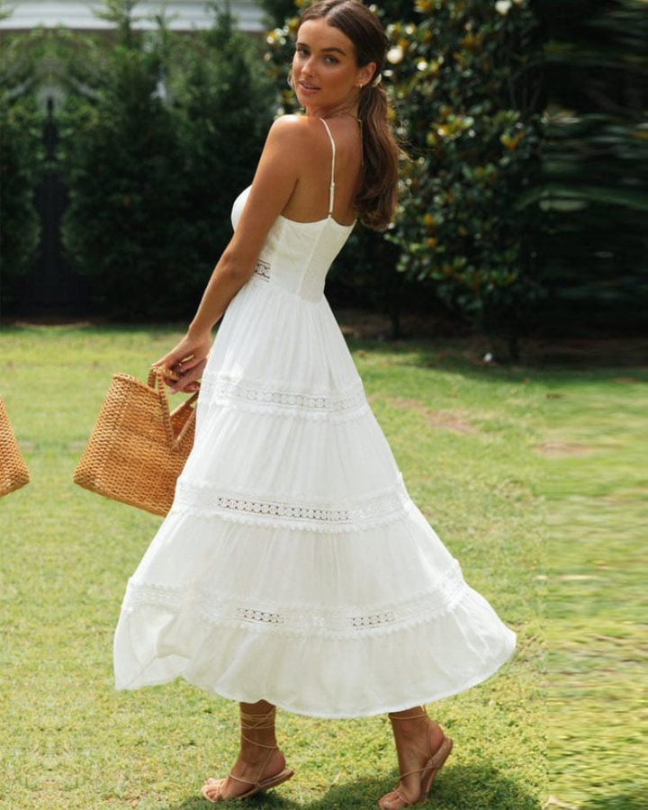 Elegant white women's lace panel boho maxi dress with spaghetti straps & a beautiful flowy tiered skirt.