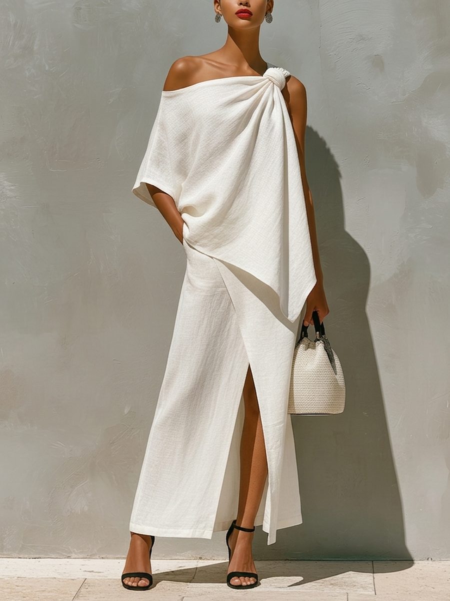 White women's one-shoulder maxi skirt set with elegant front split, perfect for summer fashion.