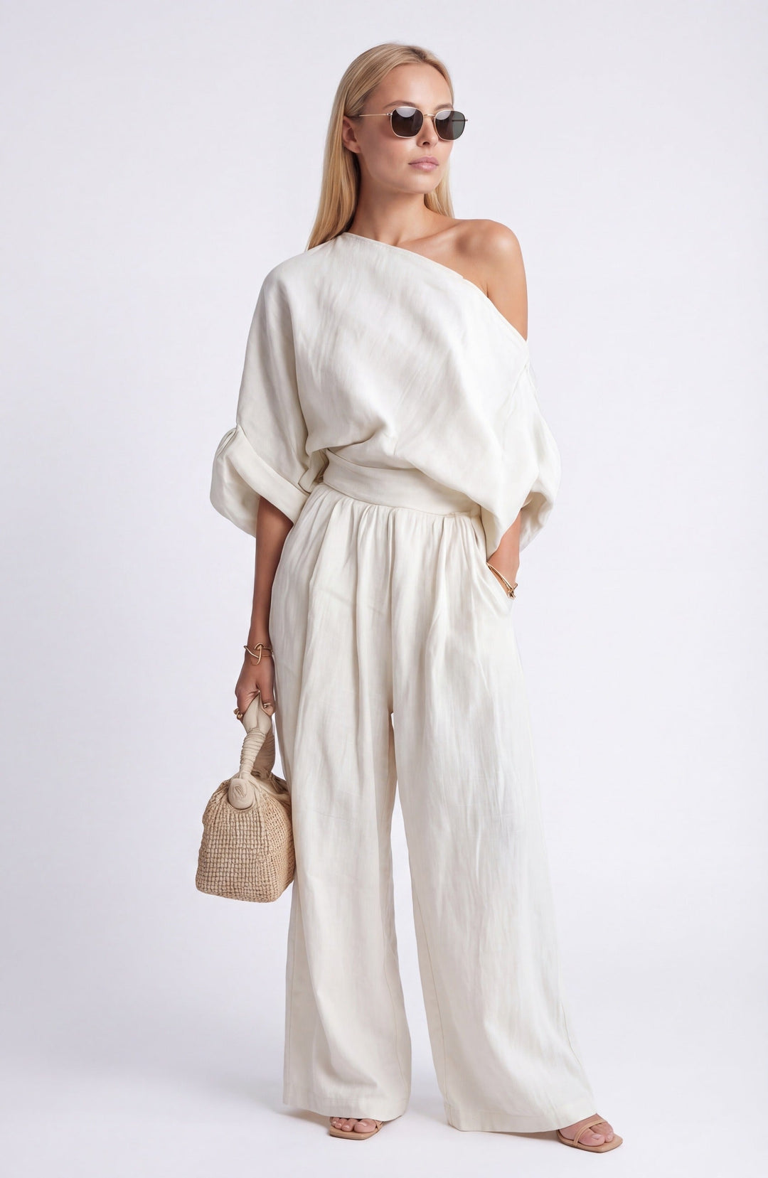 Women's two-piece relaxed blouse & wide leg trousers co-ord set, perfect for spring casual elegance.