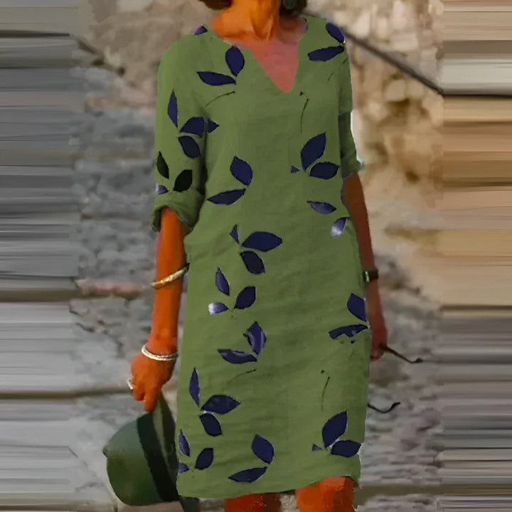 Comfortable brown women's leaf print summer dress, sleeveless midi style for effortless casual & vacation fashion.
