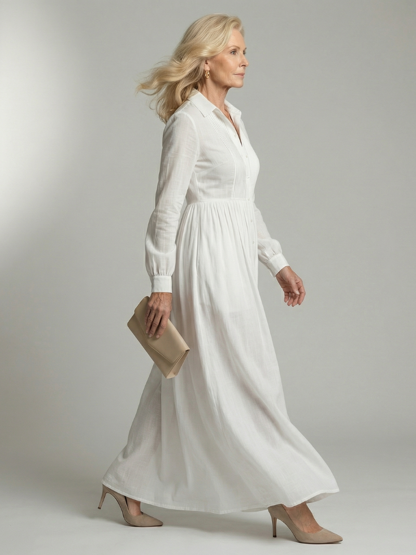 Comfortable white women's long sleeve maxi dress. Flowing fabric, versatile style for elegant casual spring & summer fashion.