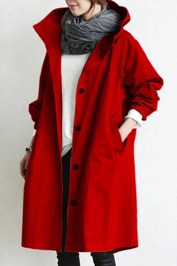 Close-up of a women's waterproof rain cape fabric, highlighting its durable and sleek texture.