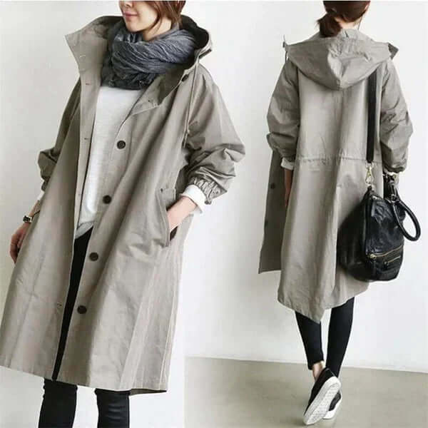 Travel-friendly women's waterproof cape, easily packable for spring and fall adventures.