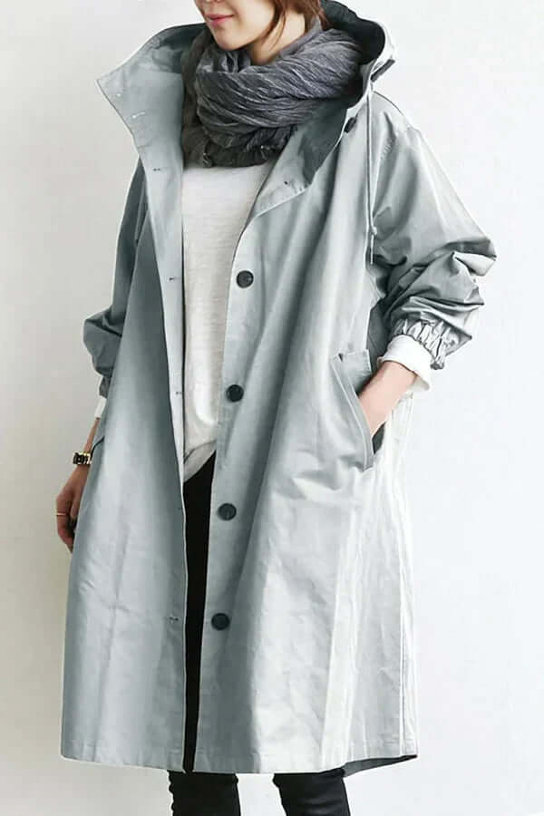 Elegant women's rain cape, designed for ultimate comfort and protection during rainy days.