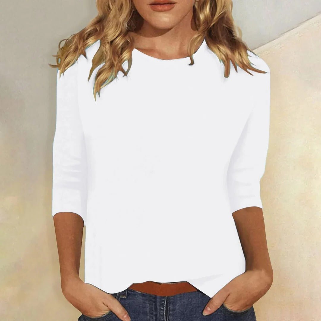 Close-up of the soft, comfortable fabric of a women's relaxed fit 3/4 sleeve crew neck top, ideal for daily wear.