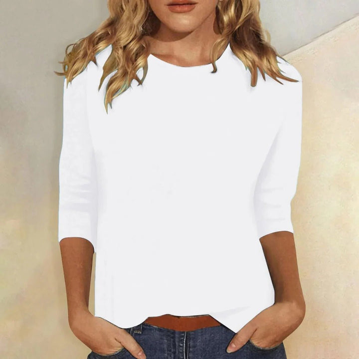 Close-up of the soft, comfortable fabric of a women's relaxed fit 3/4 sleeve crew neck top, ideal for daily wear.