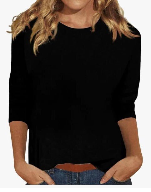 Detailed shot of the 3/4 sleeve on a women's crew neck top, highlighting its relaxed fit for easy movement.