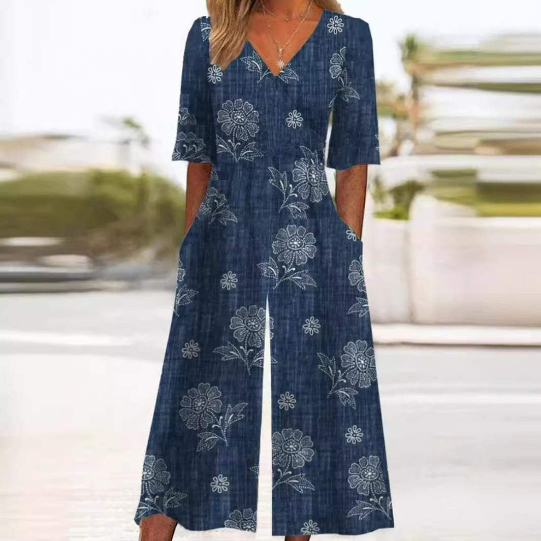 Full shot of a women's boho floral V-neck half-sleeve wide-leg jumpsuit, showcasing its effortless style.
