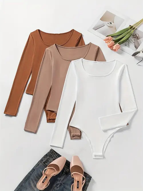 Versatile women's 3-pack long sleeve bodysuits. Ideal for layering, basic everyday style & all-season comfort.