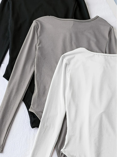 Multipack of women's long sleeve bodysuits (3). Comfortable stretch for casual everyday wear & layering fashion.