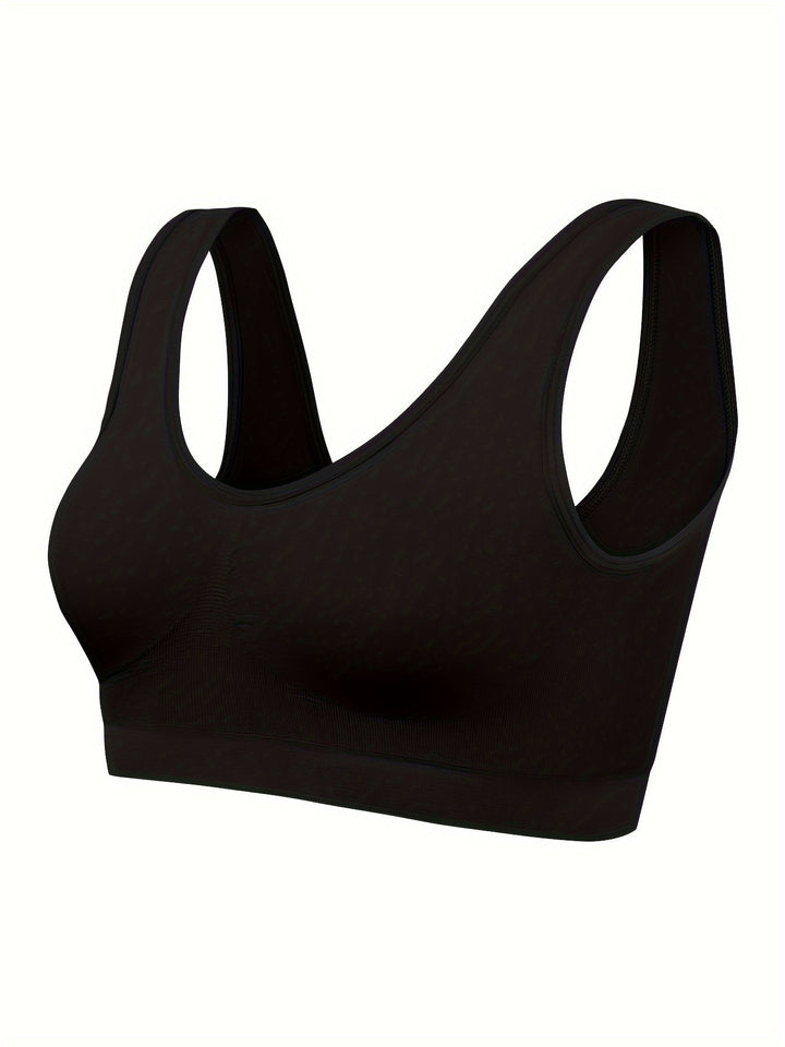 Back view of a women's 3-piece seamless sports bra and tank top set, showcasing the comfortable fit.
