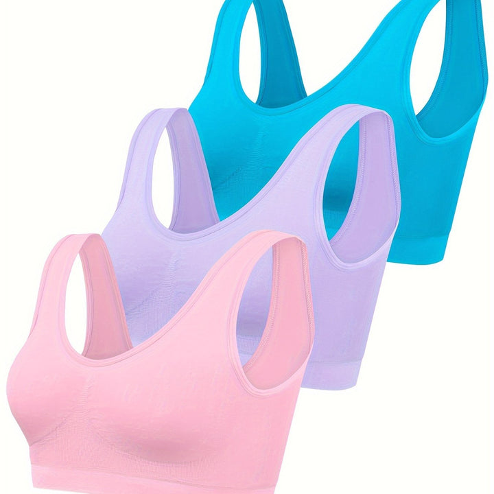 Close-up of a seamless women's sports bra & matching tank top set in a vibrant color. Athleisure comfort.