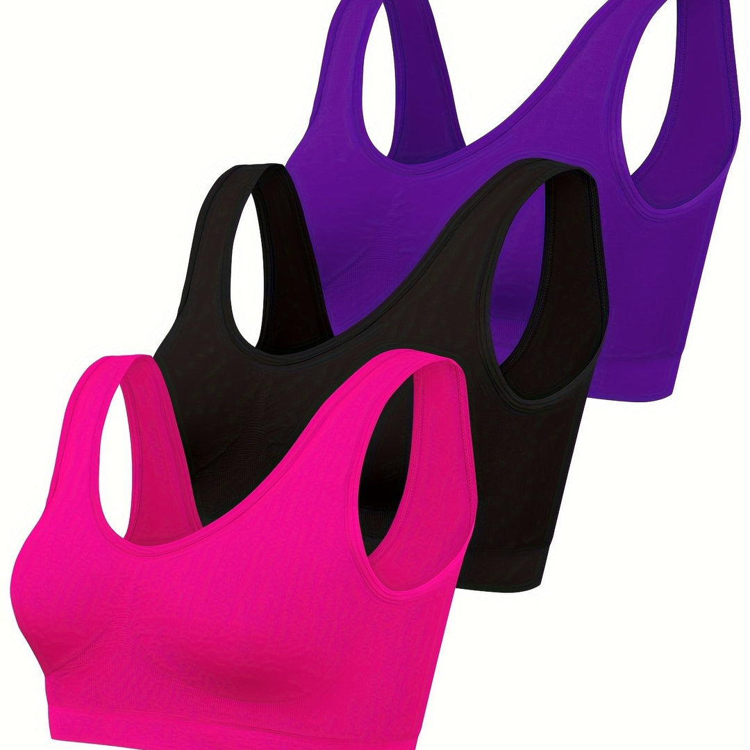 Model wearing a stylish women's 3-piece seamless tank top and sports bra set for active or casual wear.