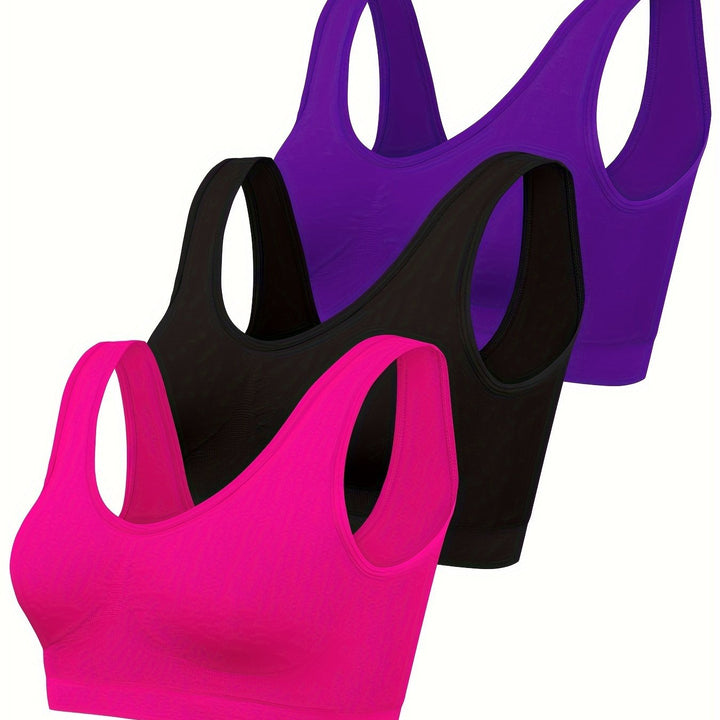 Model wearing a stylish women's 3-piece seamless tank top and sports bra set for active or casual wear.