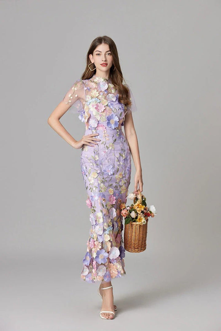 Women's 3D floral appliqué sleeveless maxi dress, styled elegantly for a memorable special occasion.