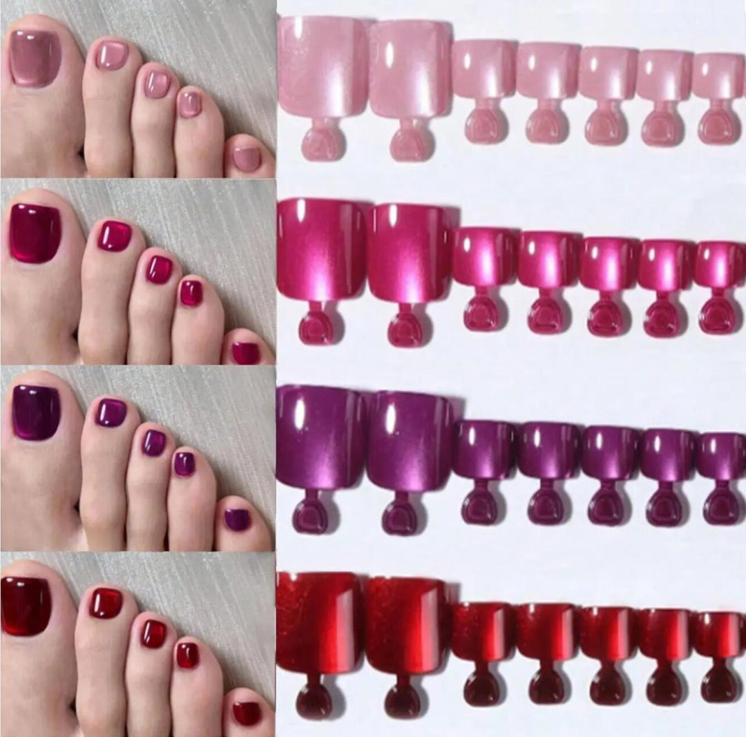 Variety of professional gel toenail polishes from a large women's beauty kit for stylish, lasting pedicures.