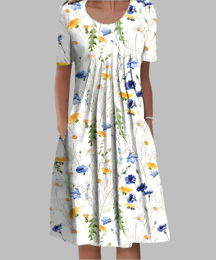 Elegant women's floral A-line midi dress. Short sleeve style perfect for casual summer days or versatile wear.