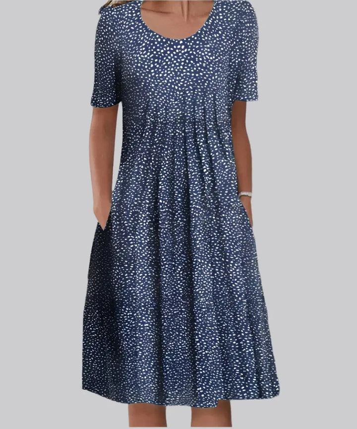 Comfortable women's A-line floral midi dress with short sleeves, ideal for a casual and elegant summer look.